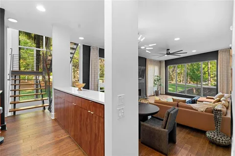 a bedroom with a bed and a couch