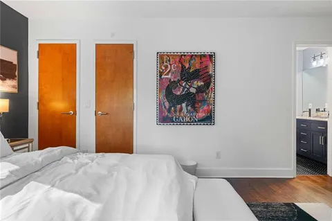 a bed room with bed and a window