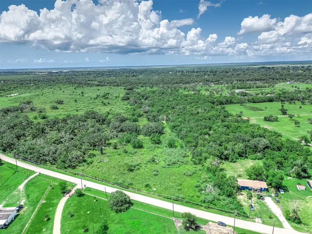 a view of a yard with an outdoor space