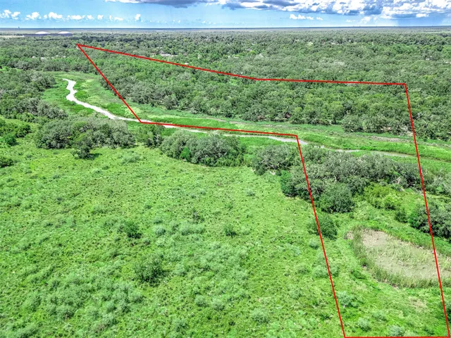 a view of a lush green field