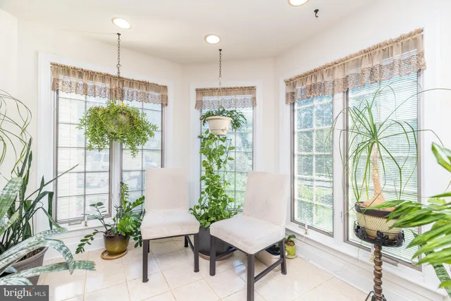a room with a sink and cabinets
