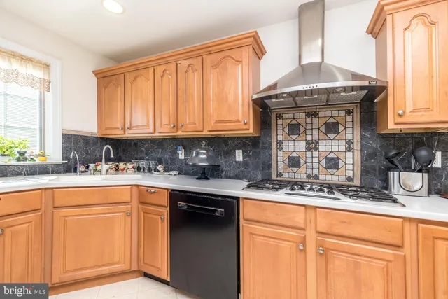 a view of workspace with furniture and window
