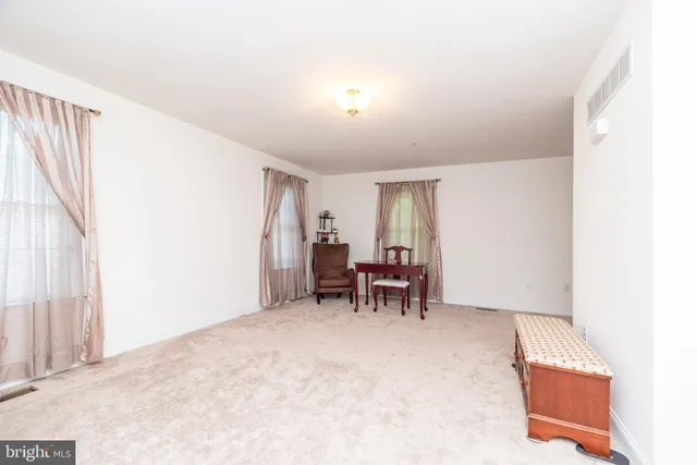 a bathroom with a sink vanity and a mirror