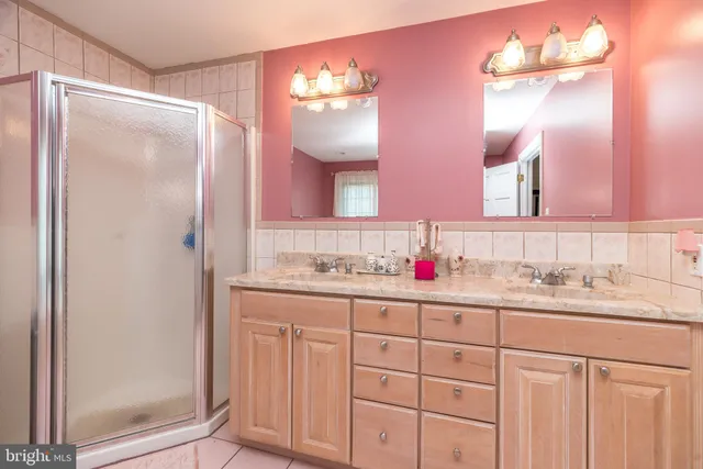 a view of entryway and hall with dining room