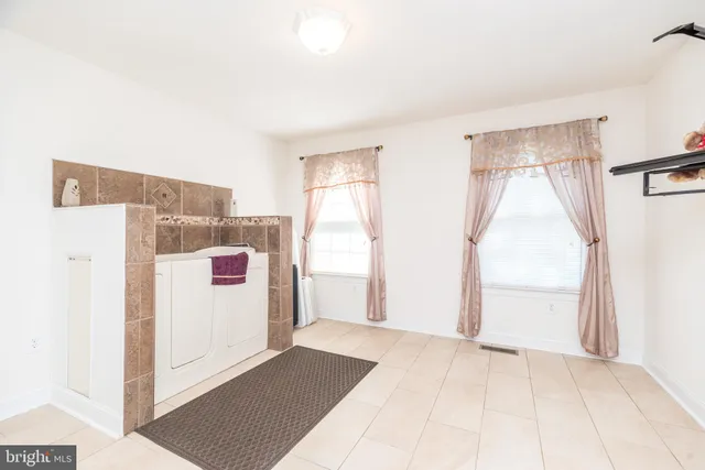 a bedroom with furniture and a bed