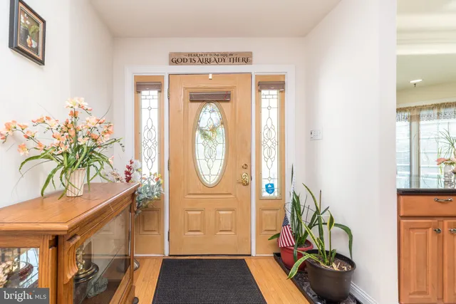 a kitchen with stainless steel appliances a refrigerator and a stove
