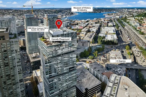 a balcony with furniture and wooden floor