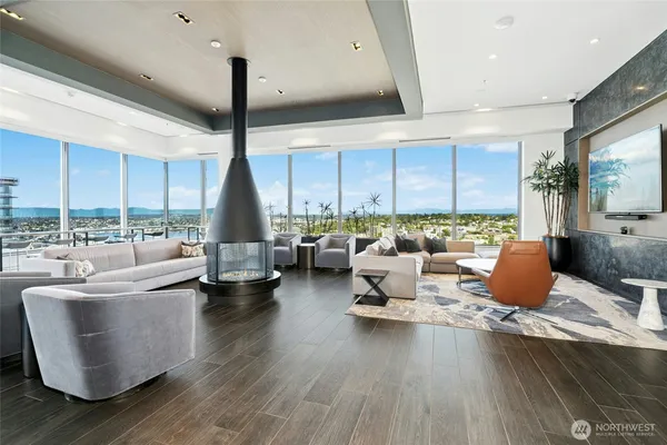 a view of a backyard with sitting area