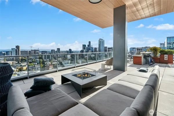 a view of a backyard with sitting area