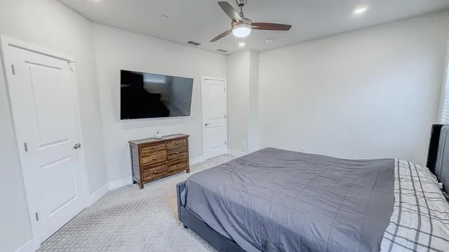 a bathroom with a double vanity sink mirror double and bathtub