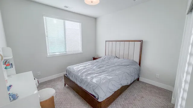 a view of a patio with a backyard table and chairs