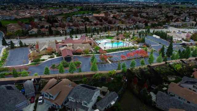 a view of a swimming pool with a deck