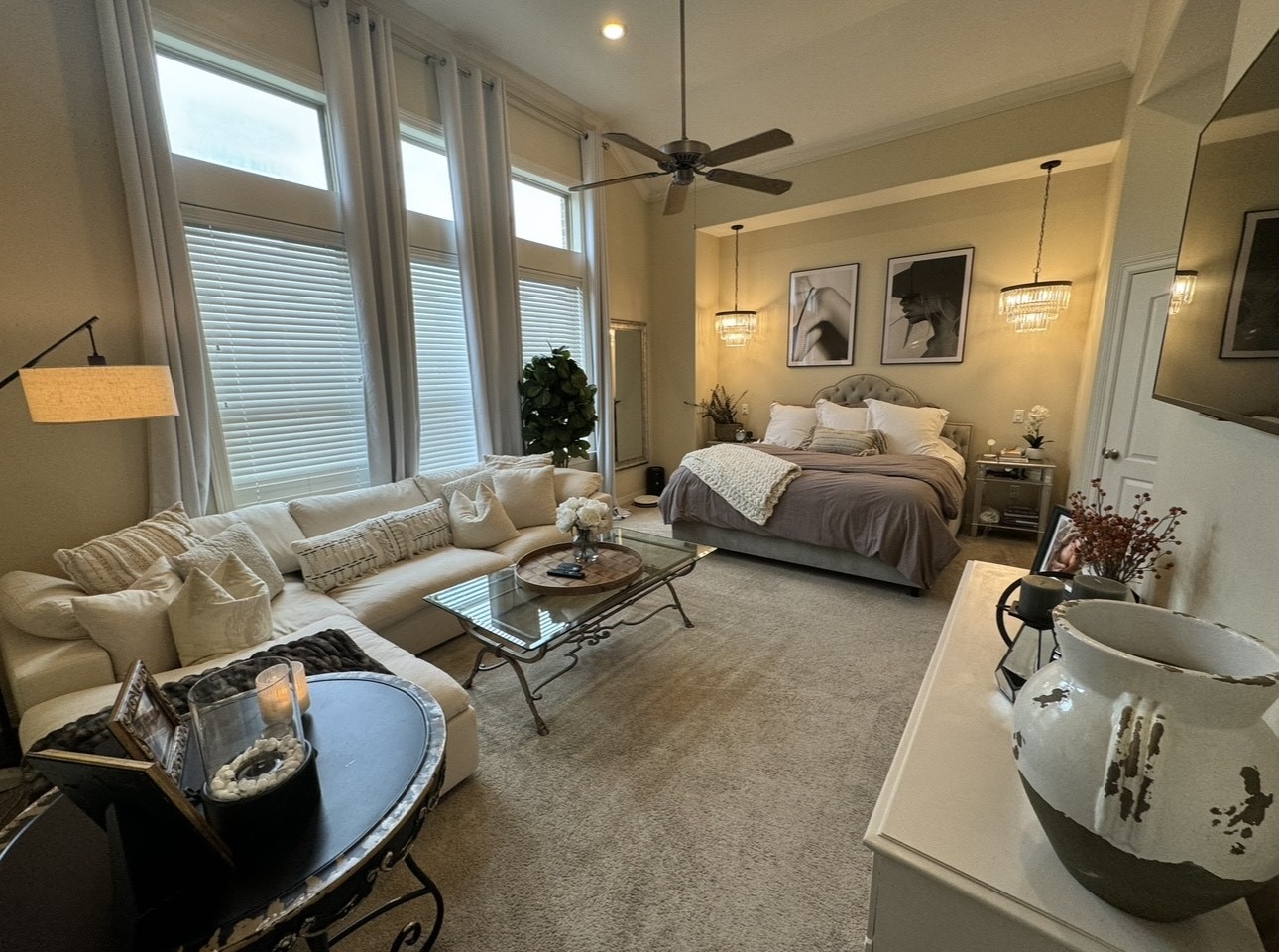 933 West 17th Street Houston, TX 77008 - Photo 7 of 19 Unwind after a long day in this incredibly Primary Bedroom! Featuring lots of natural light thanks to the large windows with privacy blinds, plush carpet, a ceiling fan and a sitting area.