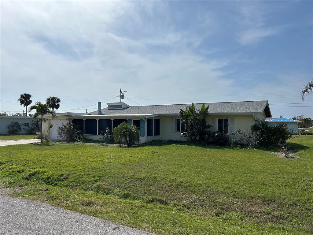 4764 Argonaut Road Venice, FL 34293 - Photo 1 of 1 a view of a house with a backyard