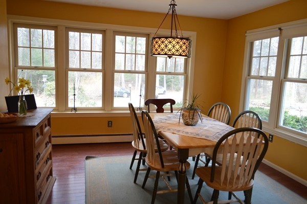 321 Hubbardston Road Princeton, MA 01541 - Photo 5 of 18 a dining room with furniture a chandelier and window
