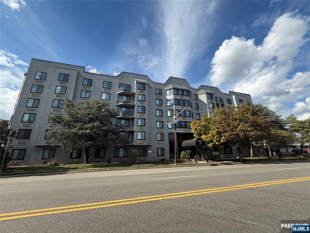 115 Polifly Road, Unit 5D Hackensack, NJ 07601 - Photo 1 of 10 a view of a building and a street