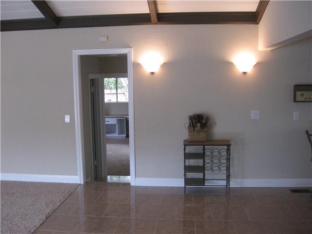 3745 Andreen Street Spring Valley, CA 91977 - Photo 11 of 25 Room for table here, between famil room y and kitchen! This family room/kitchen is one large spot and will hold a very large crowd for your biggest parties !