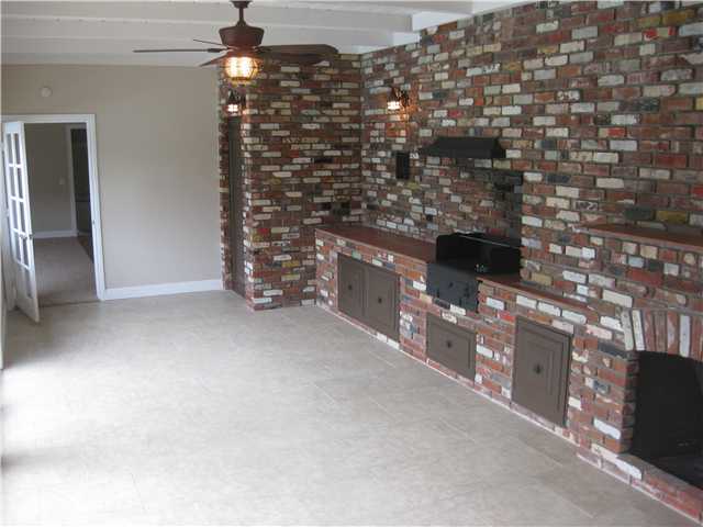 3745 Andreen Street Spring Valley, CA 91977 - Photo 19 of 25 This is open to pool deck, Here you have a wood burning fireplace and a stove for outdoor barbeques~