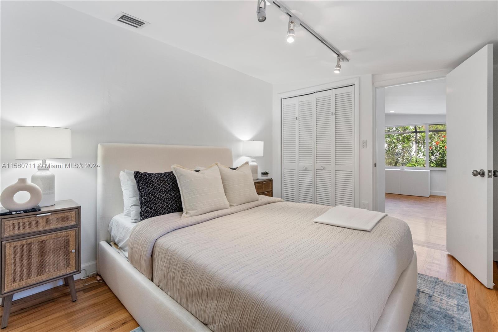 335 Southwest 31st Road Miami, FL 33129 - Photo 13 of 20 a bedroom with a bed and a window