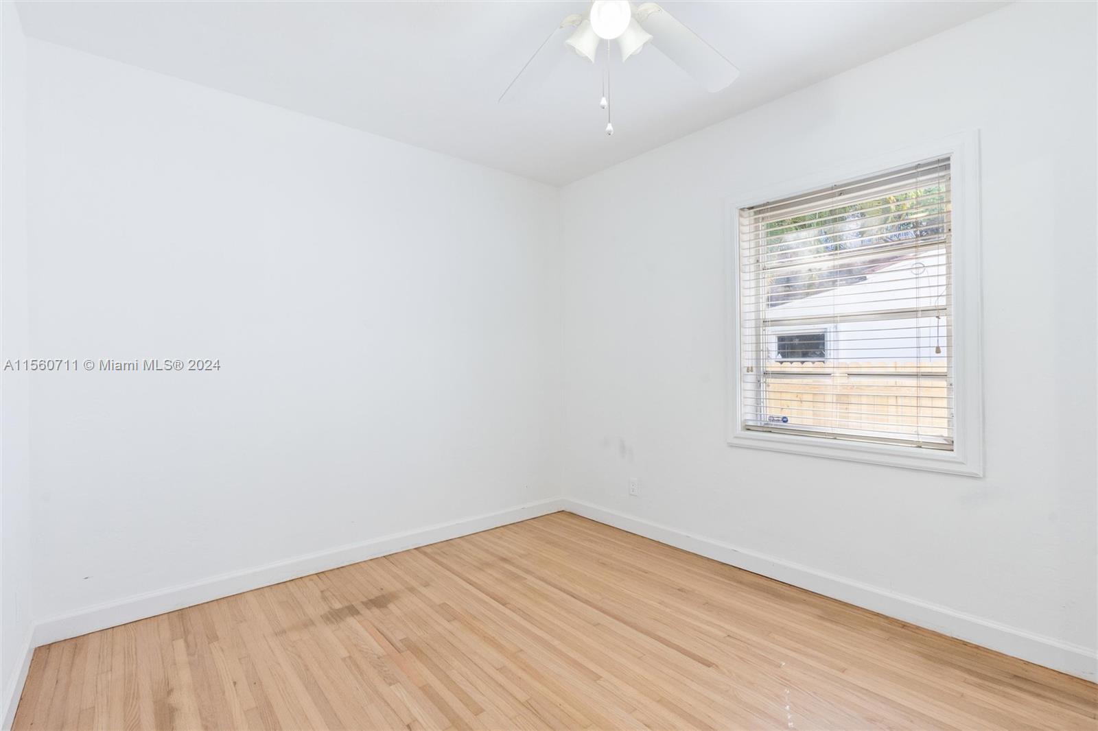 335 Southwest 31st Road Miami, FL 33129 - Photo 17 of 20 an empty room with a window