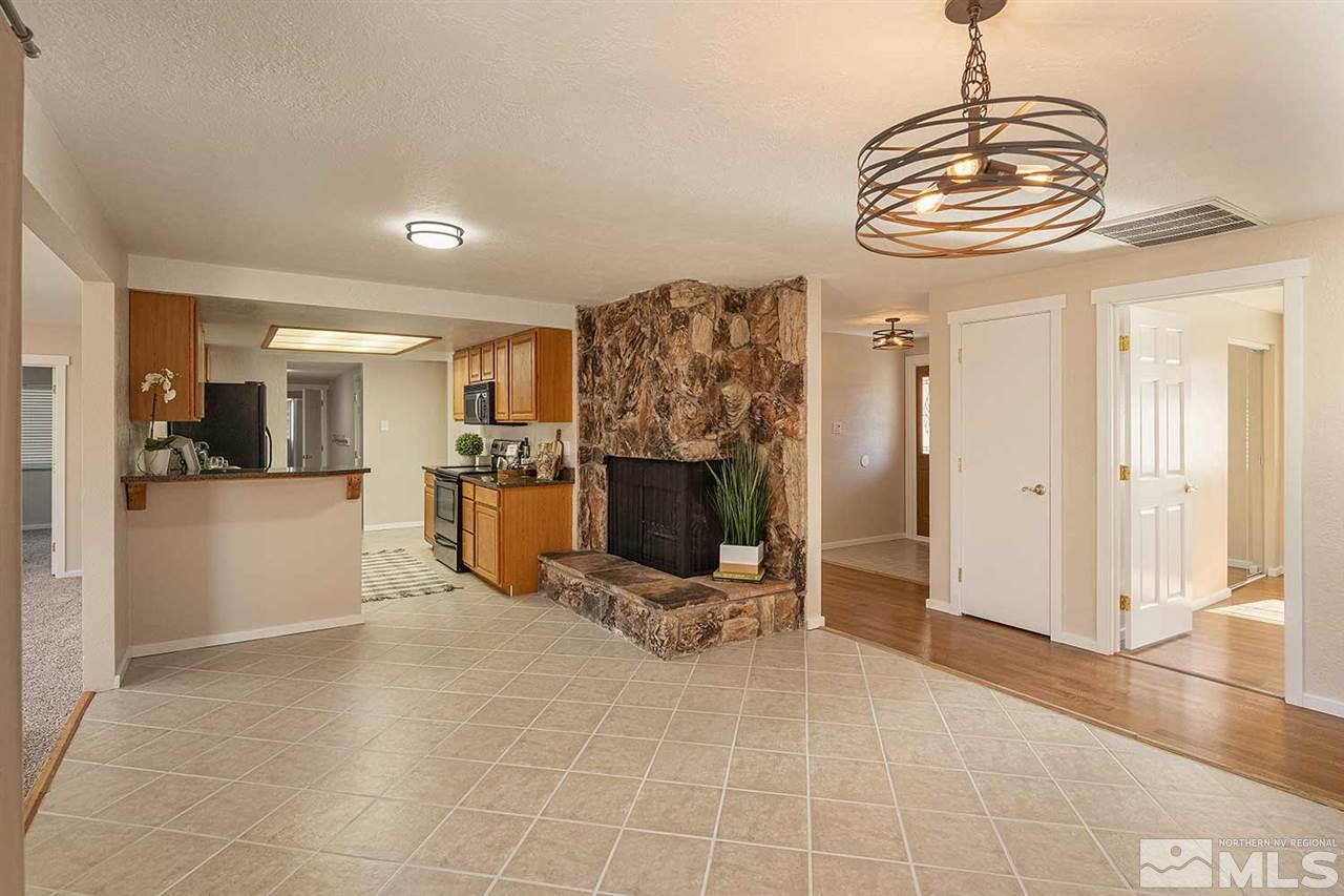 3165 Reanon Court Reno, NV 89509 - Photo 5 of 25 a view of a livingroom with kitchen and bathroom
