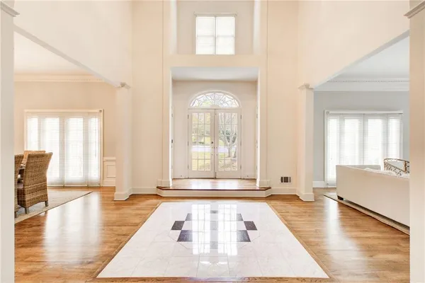 a living room with furniture and fireplace