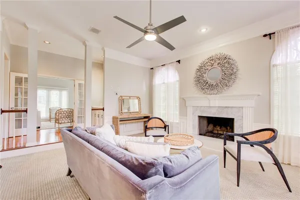 a living room with furniture and a table