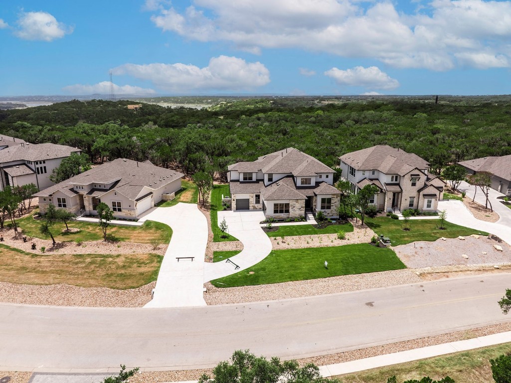 4608 Destination Way Jonestown, TX 78645 - Photo 2 of 29 an aerial view of residential houses with outdoor space