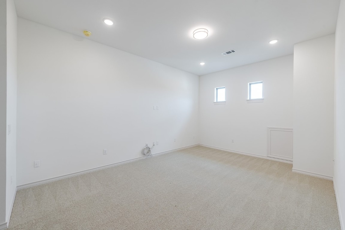 4608 Destination Way Jonestown, TX 78645 - Photo 24 of 29 an empty room with a empty space and window