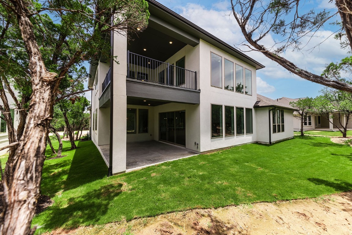 4608 Destination Way Jonestown, TX 78645 - Photo 29 of 29 a view of a porch with a yard
