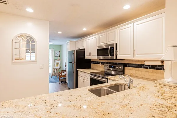 $342,000 | 1310 Yesica Ann Circle, Unit H203, Naples, FL 34110