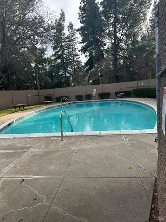 a backyard of a house and trees