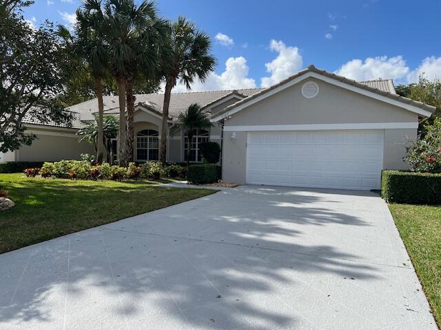 7765 Rockford Road Boynton Beach, FL 33472 - Photo 2 of 31 Long driveway