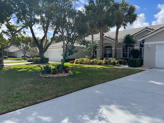 7765 Rockford Road Boynton Beach, FL 33472 - Photo 3 of 31 EXTERIOR FRONT