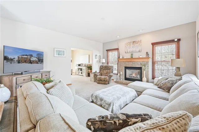 a bedroom with a bed and a window dresser