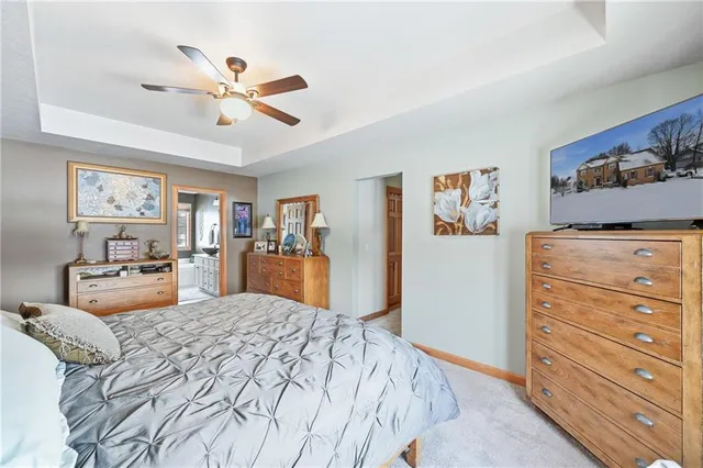 a living room with furniture a air conditioner and a window