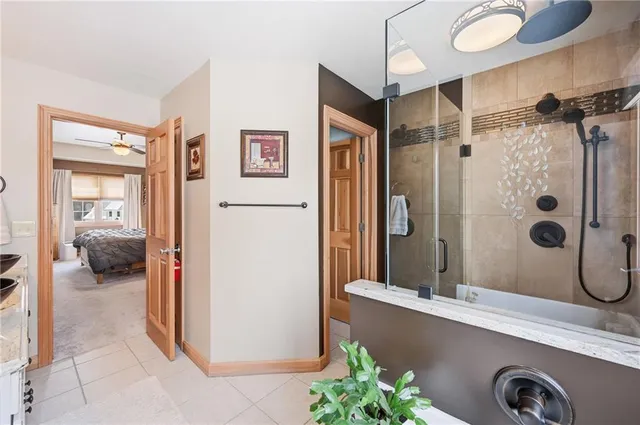 a view of a patio with a table and chairs