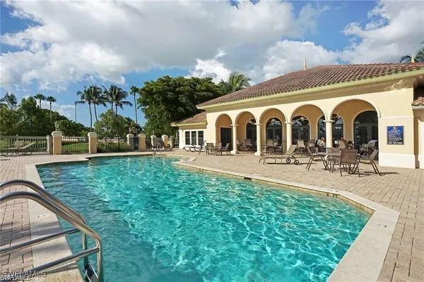 a front view of a house with garden and porch