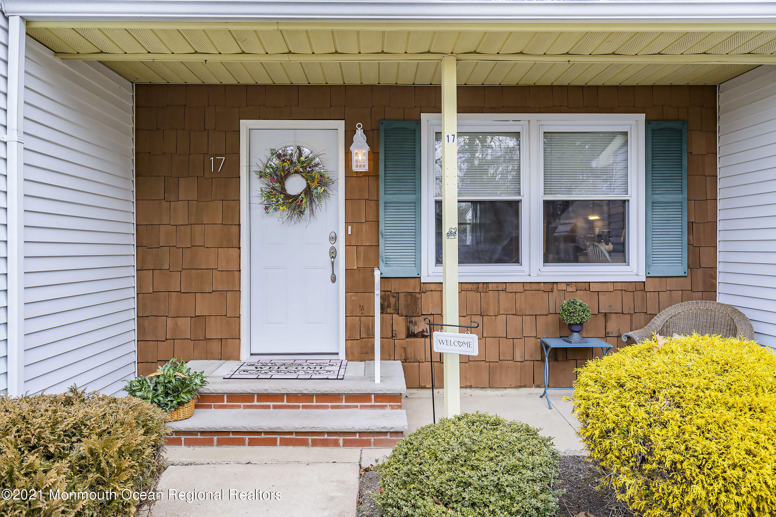 17 Berry Hill Road Whiting, NJ 08759 - Photo 2 of 26 a front view of a house with a garden