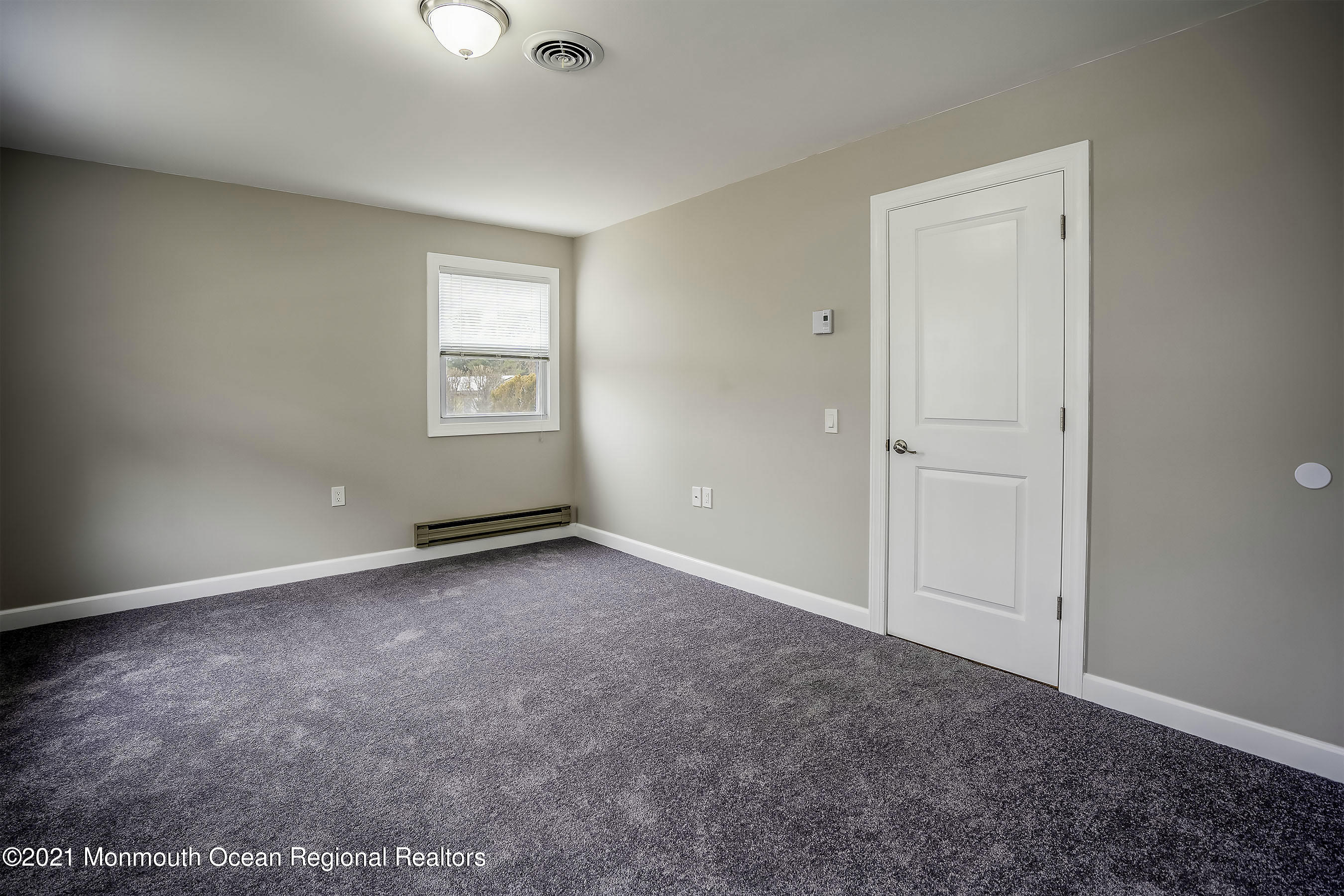 17 Berry Hill Road Whiting, NJ 08759 - Photo 17 of 26 an empty room with windows and closet