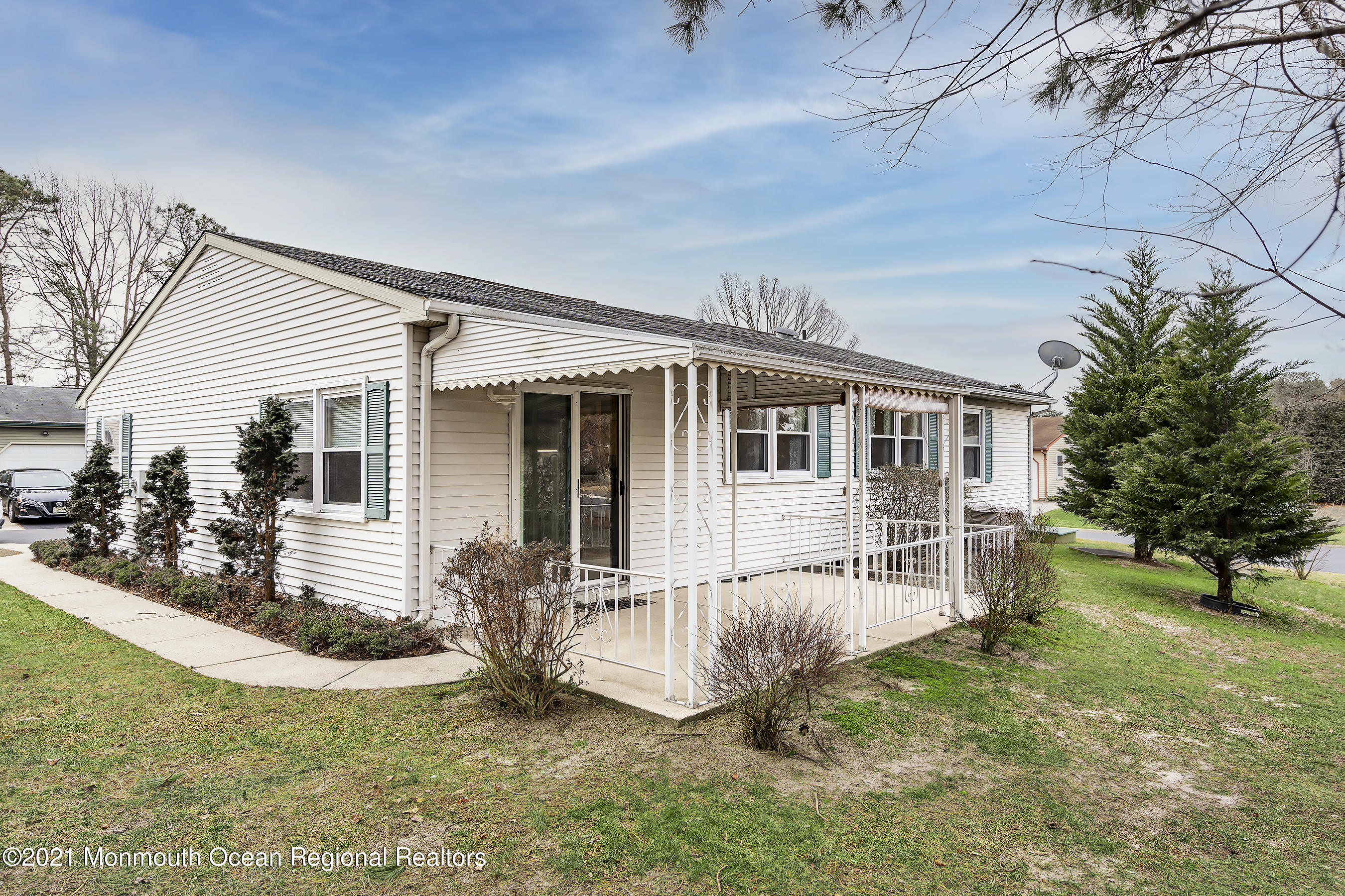 17 Berry Hill Road Whiting, NJ 08759 - Photo 23 of 26 a front view of house with yard outdoor seating and barbeque oven