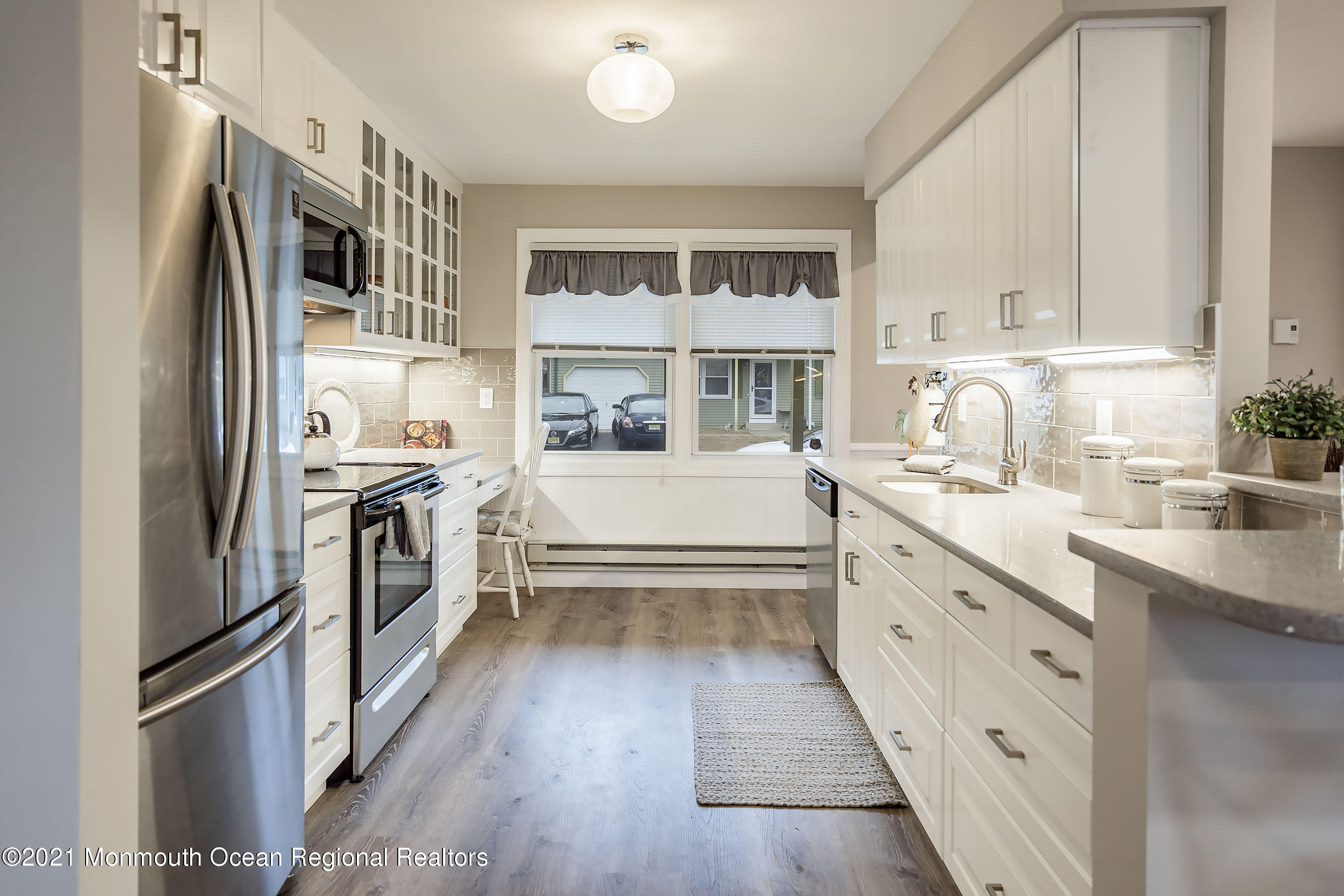 17 Berry Hill Road Whiting, NJ 08759 - Photo 7 of 26 a kitchen with stainless steel appliances a refrigerator sink and cabinets