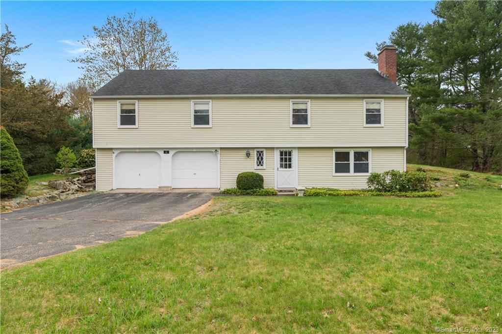 a view of outdoor space yard and front view of a house