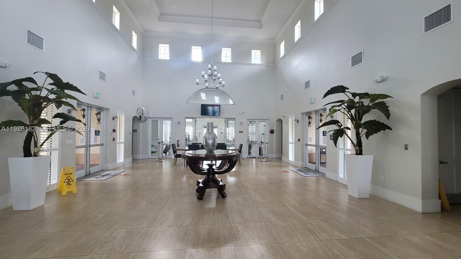 12842 Southwest 134th Street Miami, FL 33186 - Photo 21 of 22 a view of a room with gym equipment