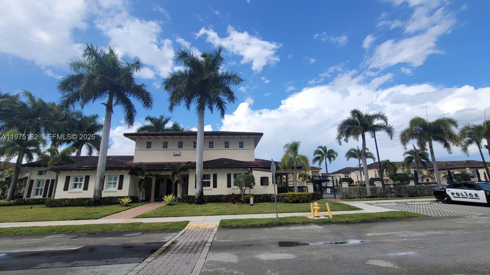 12842 Southwest 134th Street Miami, FL 33186 - Photo 22 of 22 a view of multiple houses with a yard