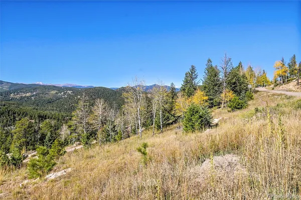 a view of mountain view with mountains in the background