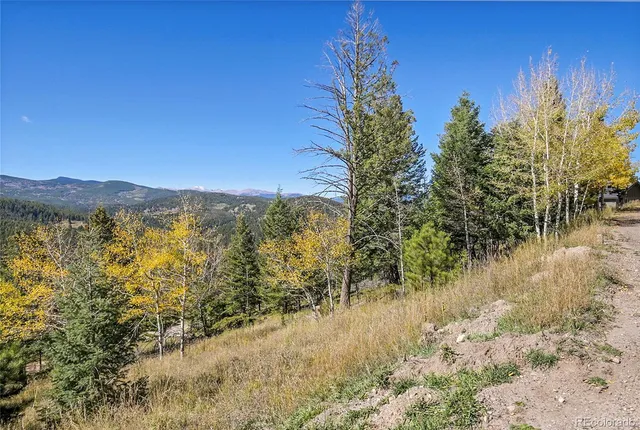 a view of lake with mountain