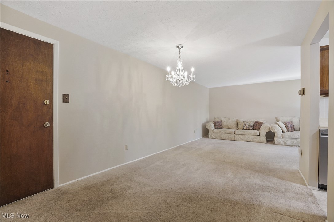 3068 Kent Road, Unit 506 Stow, OH 44224 - Photo 6 of 36 dining area looking into the living room
