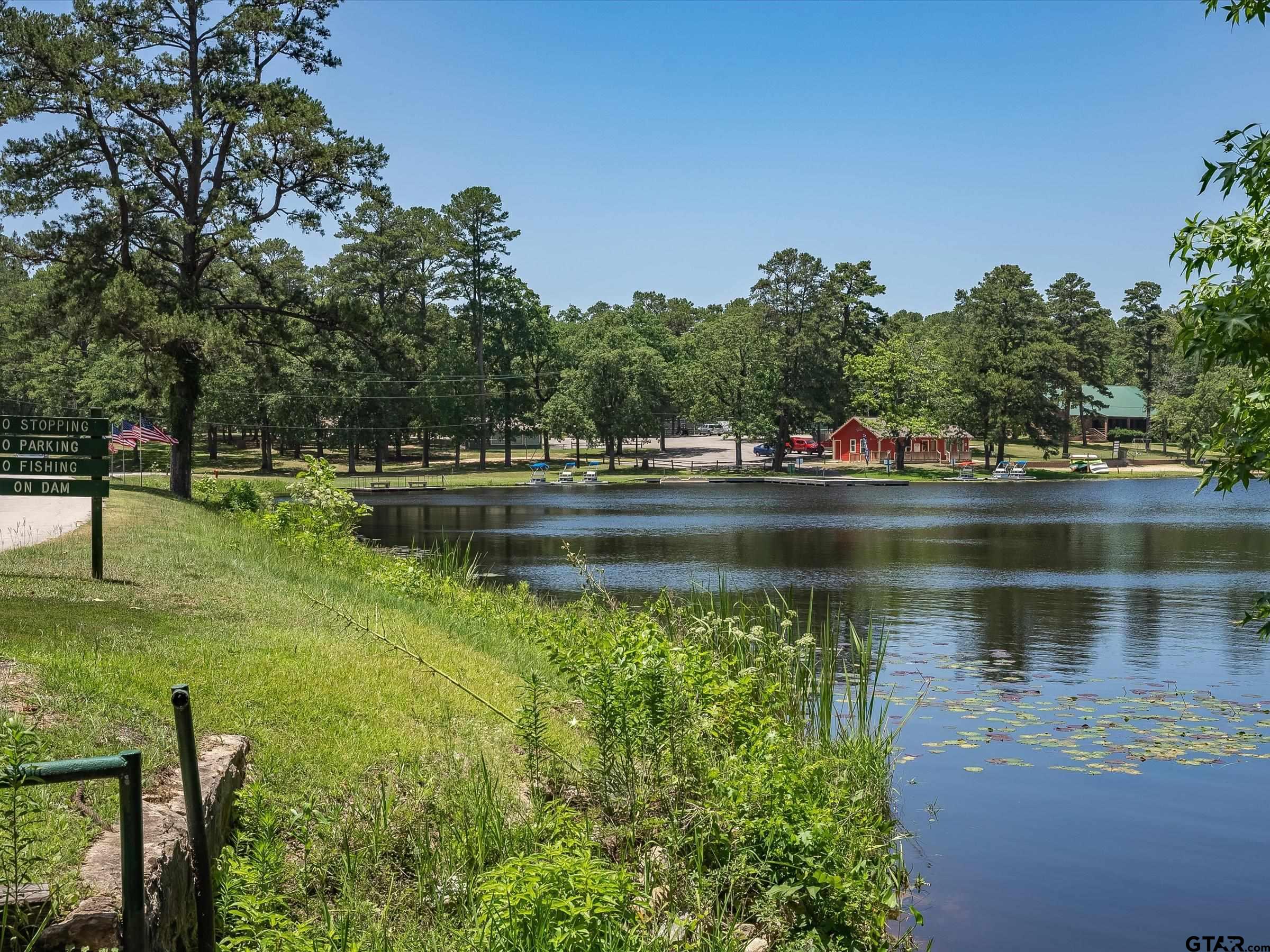 289 Llano Bend Holly Lake Ranch, TX 75765 - Photo 28 of 48 a view of a lake with houses with outdoor space