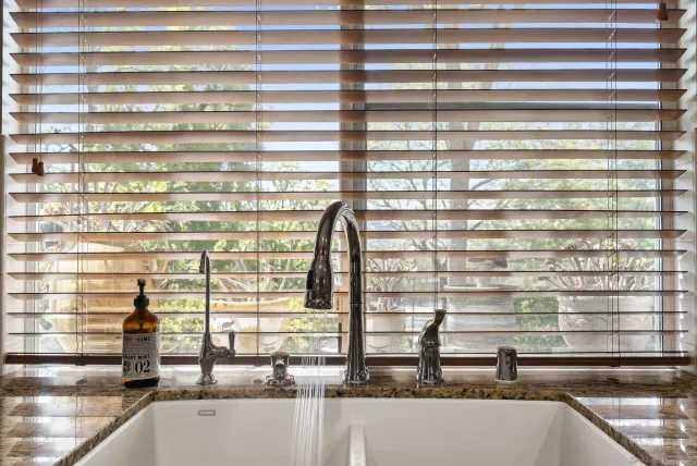 a close view of sink and a window